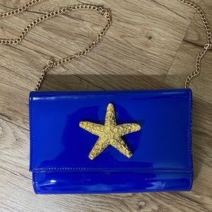 24kt gold Starfish Clutch Blue patent leather bag with detachable chain